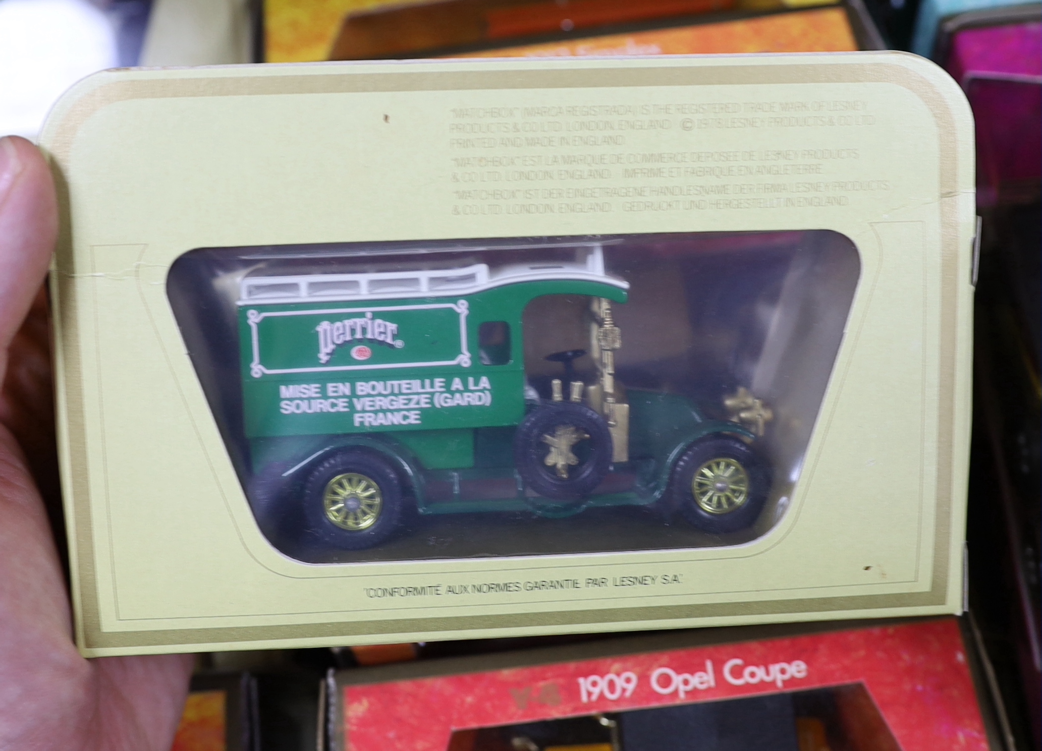 A collection of boxed Matchbox Models of Yesteryear (94 vehicles) in a variety of era boxes, mostly cream window boxes, some ‘wood effect’ boxes, etc.